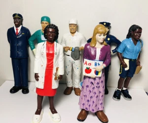 7  occupational figurines ￼Doctor nurse teacher police Doorman painter Mail lady - Picture 1 of 7