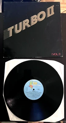 Turbo II (2) Vinyl Record Vol. I (1) Foto 1 de 2