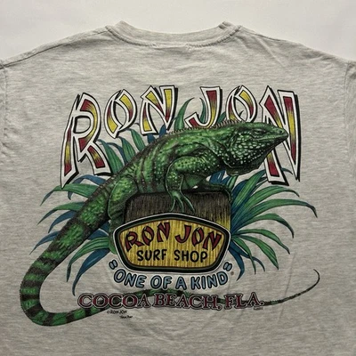 Camiseta De Colección Ron Jon Surf Shop Iguana Cocoa Beach Florida Gris Bolsillo Talla L Foto 1 de 4