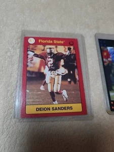 THREE FOOTBALL CARDS DEION SANDERS, DEVIN HESTER, ADRIAN PETERSON - Picture 1 of 6