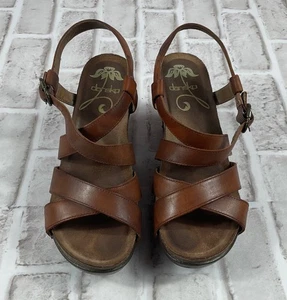 Dansko Frida Sandalen Damen Gr. 37 EU Whiskey Braun Leder Nieten Keilabsatz - Bild 1 von 7