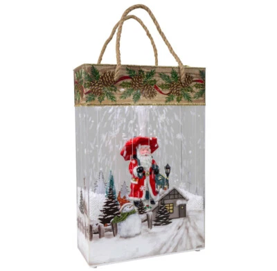 Schneiende LED Laterne in Geschenktüten optik 33cm, Weihnachtsmann, Innen-Deko - Bild 1 von 3