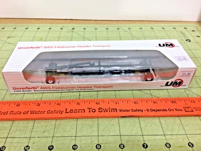 1/64 Unverferth AWS Fieldrunner metal black header transport trailer by SpeCast - Image 1 of 4
