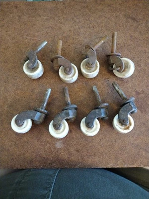 Set of 8 Antique Victorian Furniture Casters 1 3/4 Inch White Porcelain Wheels - Image 1 of 4