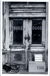 STOREFRONT Selling EGGS RPPC - Postcard - Picture 1 of 2