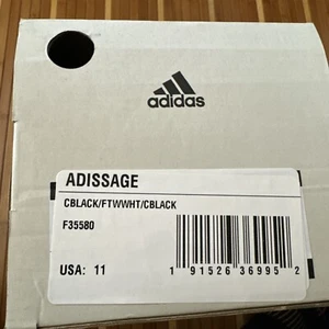 Adidas Adissage Para Hombre Diapositivas - Núcleo Negro/Blanco Nube/Núcleo Negro, EE. UU. 11 - Imagen 1 de 6