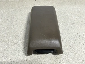 Chrysler Sebring 2004 consola central tapa reposabrazos color marrón OEM - Imagen 1 de 3