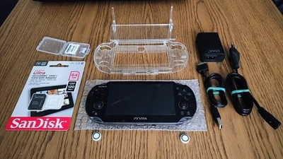 PlayStation Vita * firmware 3.65 * 64 GB di memoria * pacchetto software/hardware * PERFETTO - Immagine 1 di 4