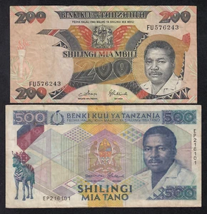 TANZANIA LOT BANKNOTE - 200 AND 500 SHILINGS  - P18/P21 - 1986/1989 - VF 🇹🇿 - Picture 1 of 3