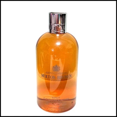 Gel de baño y ducha Molton Brown Sunlit Clementine & Vetiver 300 ml / 10 fl oz Foto 1 de 4