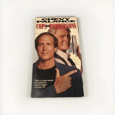 Cops & Robbersons (VHS, 1994) Chevy Chase Jack Palance Rated PG Foto 1 de 4