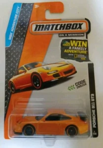 MATCHBOX ON A MISSION PORSCHE 911 GT3 ORANGE NEW 2013 1/60 - Picture 1 of 3