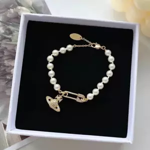 Vivienne Westwood /Pearl bracelet Gold - Picture 1 of 5