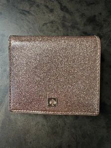 KATE SPADE ROSE GOLD GLIMMER SPARKLE BI FOLD WALLET PATENT LEATHER - Picture 1 of 7