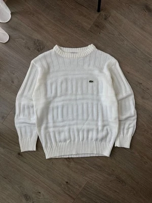 Suéter de punto acanalado blanco Lacoste de colección Foto 1 de 4