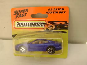 1993 MATCHBOX SUPERFAST 63 BLUE ASTON MARTIN DB-7 LAGONDA NEW ON CARD - Picture 1 of 6