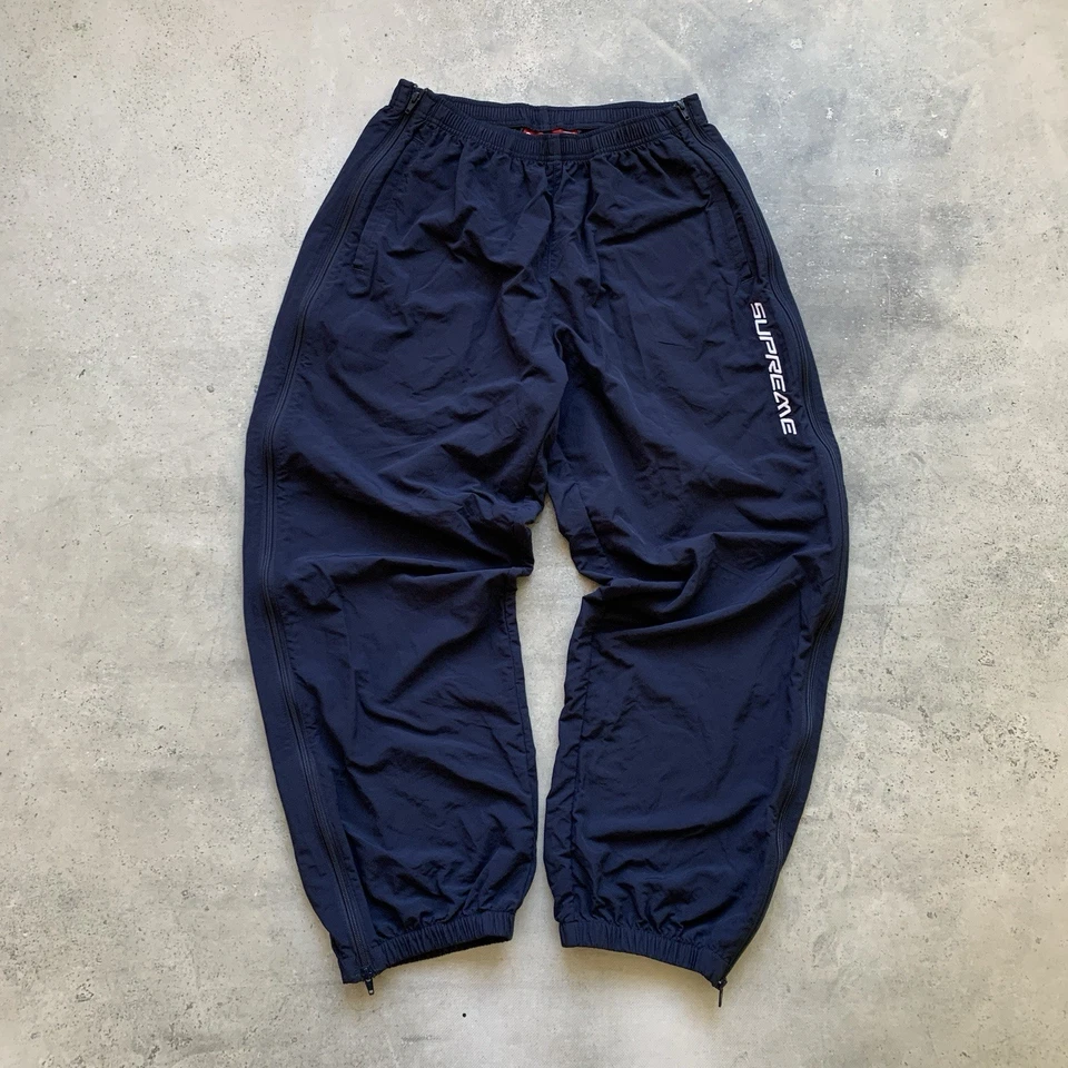 PANTALONES DEPORTIVOS SUPREME CREMALLERA COMPLETA HOLGADOS CALENTAMIENTO TALLA L Foto 1 de 4