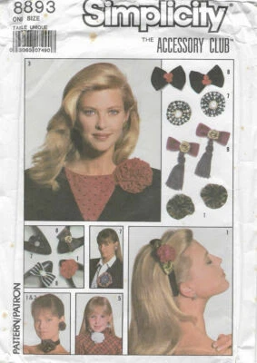 C56 SIMPLICITY 8393: ACCESSORY 4 SHOES, HAIR AND CLOTHES  SEWING PATTERN - Image 1 of 2