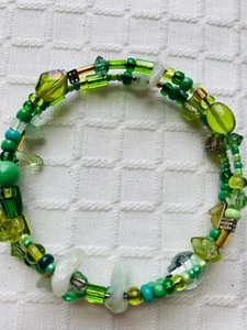 VINTAGE GLASS AND STONE ON WIRE WRAP STYLE BRACELET. MULTI COLOR, MOSTLY GREEN - Picture 1 of 5