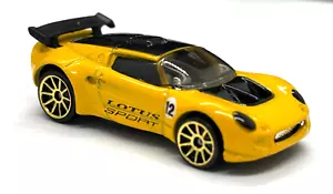ELITE LOTUS ELISE SPORT CON ALERÓN HORIZON COLOR AMARILLO ESCALA 1:64 HW MFG 2003 - Imagen 1 de 9