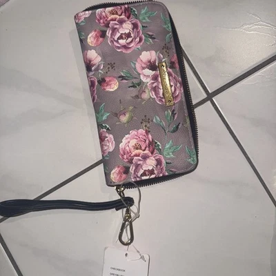 Cartera larga con cremallera alrededor de Betsey Johnson nueva con etiquetas. Flor  Foto 1 de 4