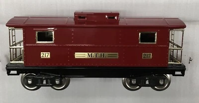 Tinplate Traditions by MTH 10-2158 #217 Red w/Brass Caboose, Standard Gauge - Image 1 of 4