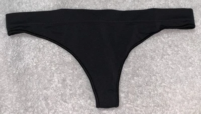 OUT FROM UNDER Seamless Black Thong Panty NEW Womens Sz XS / S 4 / 5 - Image 1 of 4