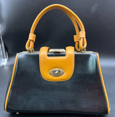 Bolso Cartera Vintage MCM Cuero Sintético Negro y Tostado Tres Compartimentos Foto 1 de 4