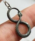 Silver ouroborus snake pendant with 18 inches chain new,never worn