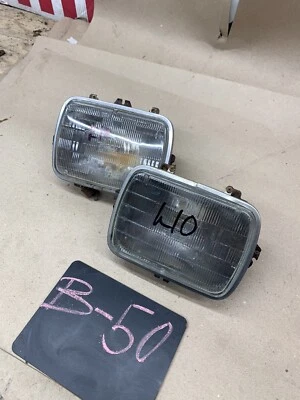 CHEVY GM GMC 2x 5x7 HEADLIGHT BULBS HOUSINGS TRIM RINGS BOX SQUARE LITE BEAMS 84 - Image 1 of 4