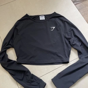 GYMSHARK Crop Top Longsleeve, Schwarz, Gr. S, Langarmshirt Bauchfrei - Bild 1 von 2