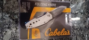 Cabela's New Silver Folding Knife Titanium-Coated 420 Steel Blade. - Picture 1 of 3