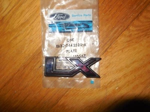 Ford Tempo LX 1986-1990 emblema tapa maletero E63Z-5442528-A nuevo de lote - Imagen 1 de 2