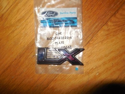 Ford Tempo LX 1986-1990 emblema tapa maletero E63Z-5442528-A nuevo de lote Foto 1 de 2