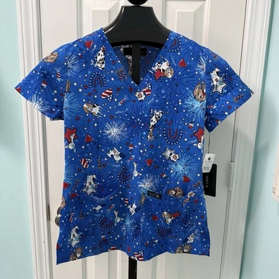 NWT Koi Basics Women's Size XS Leslie Boom Boom 4th of July American Scrub Top - Image 1 of 4