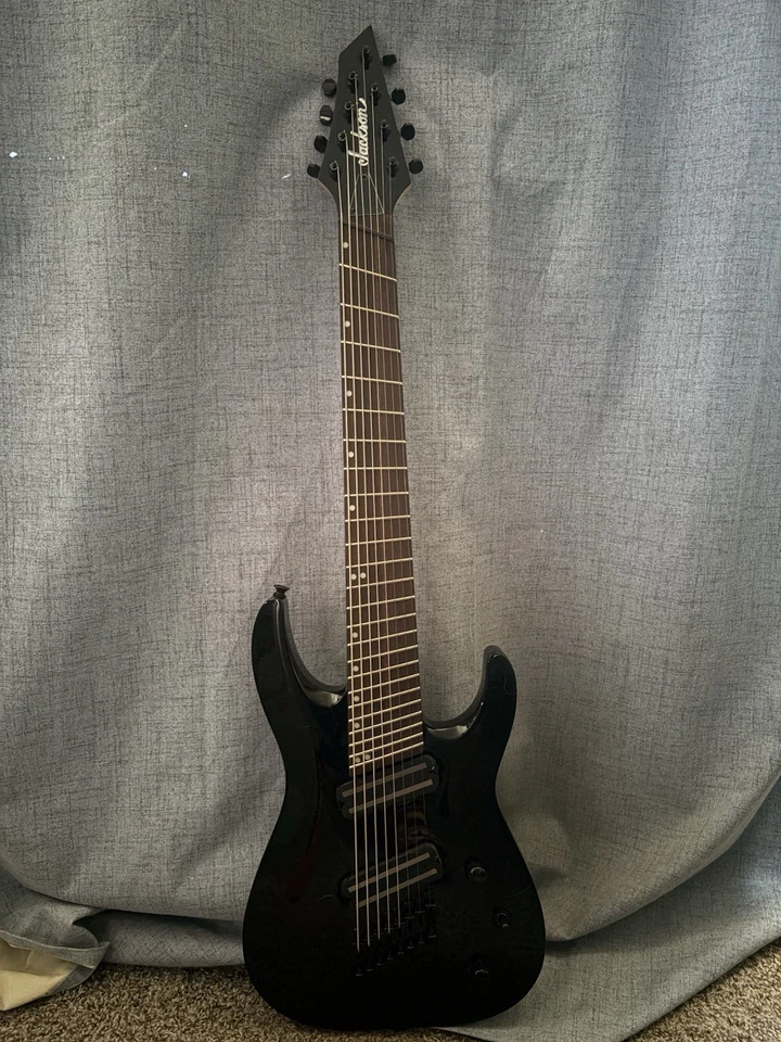 Guitarra Eléctrica Jackson X Series Dinky Arch Top DKAF8 MS 8 Cuerdas Negra Brillante Foto 1 de 2
