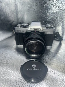 Minolta XG-M fotocamera reflex pellicola 35 mm obiettivo argento Makinon [non testato] - Foto 1 di 3