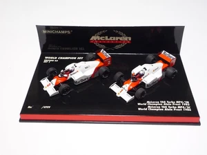MINICHAMPS 1:43 McLAREN MP4/2B, MP4/2C A. PROST WORLD CHAMPION SET 1 "Marlboro" - Picture 1 of 9