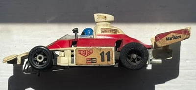 AFX AURORA G-PLUS 1976 McLaren M23 #11 TEXACO-MARLBORO James Hunt HO Slot Car - image 1 of 4
