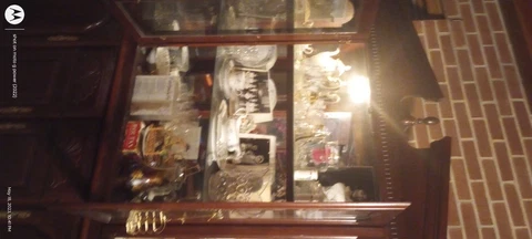 40 year old blue china in a cherry hutch Cover
