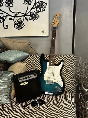 Guitarra eléctrica Zeny con estuche de amplificador Foto 1 de 4