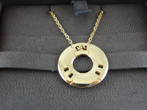 HERMÈS Collana con ciondolo HERMES tondo H in oro giallo