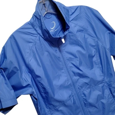 Chaqueta cortavientos Zero Restriction MED Storm azul manga corta cremallera completa para mujer Foto 1 de 4