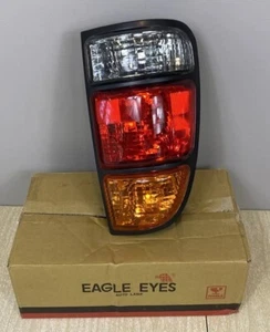 Fits 00-06 Tundra w/Bulbs & Wiring Eagle Eyes Driver Side Tail light TY689-B000L - Picture 1 of 8