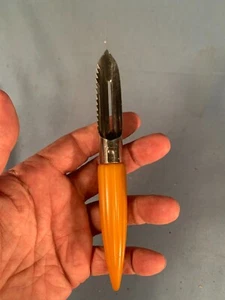 Vintage Butterscotch Bakelite Handled Androck Bullet Pattern Potato Peeler Corer - Picture 1 of 4