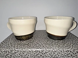 Juego de 2 - Starbucks Crema y Bronce Metálico Remolino 12 oz. Taza de café-2013 usada en excelente estado - Imagen 1 de 8