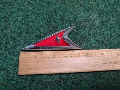 Conjunto emblema parachoques delantero Pontiac Bonneville 2000-2004 OEM GM 19207391 1L4 Foto 1 de 4