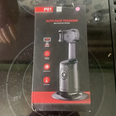 Auto Face Tracking Tripod with Remote 360° Rotation Tracking Phone Holder Stand - Image 1 of 4