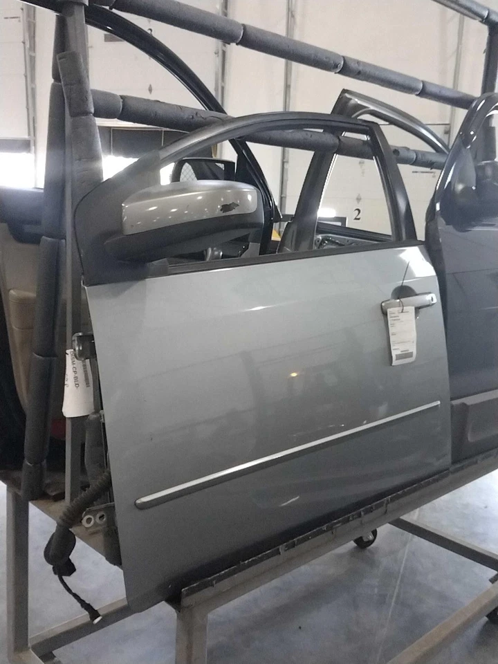 Nissan Sentra 2009 puerta delantera izquierda gris 592685 usado 162 k millas Foto 1 de 4