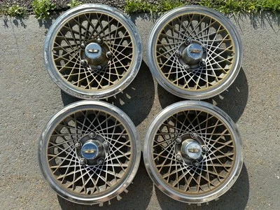 4 77-87 Chevy Caprice 15” Hubcaps Wheel Covers Basketweave Style - Image 1 of 4